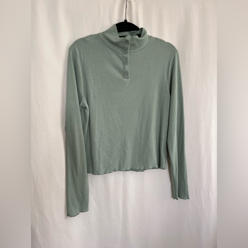 Light green turtle neck